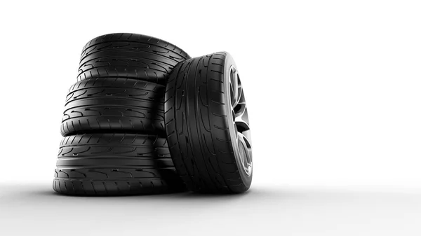 Pile de pneus neufs, isolé sur fond blanc — Photo