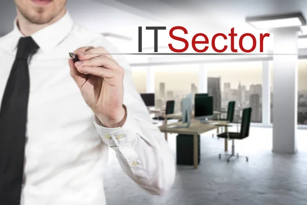 Businessman in office building writing it sector in the air — Stock Photo, Image