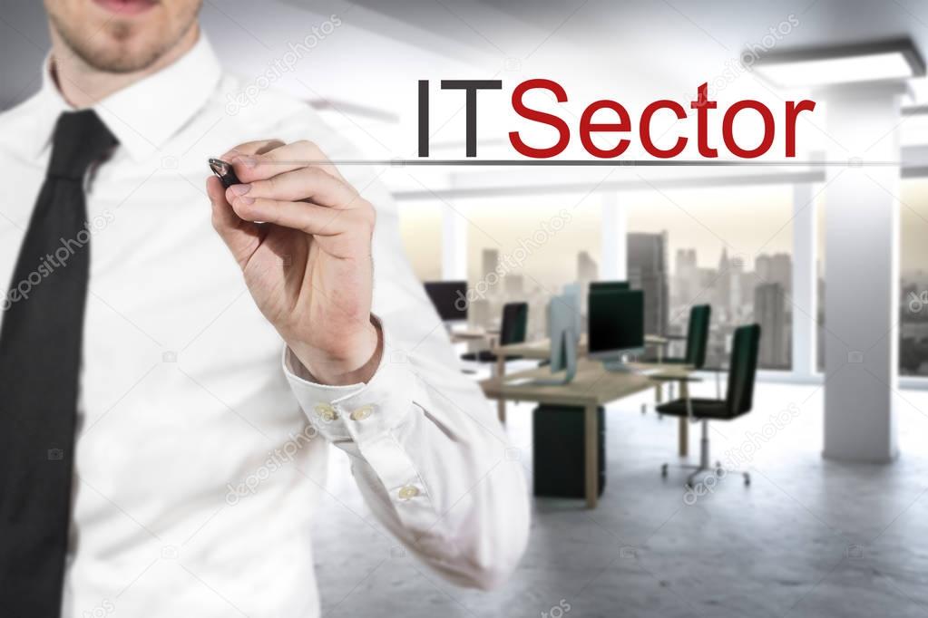 businessman in office building writing it sector in the air