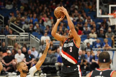 Portland Traillblazers oyuncusu CJ Mccollum # 3, 2 Mart 2020 tarihinde Orlando Florida 'daki Amway Center' da oynanan maçta şut çekti. Fotoğraf: Marty Jean-Louis