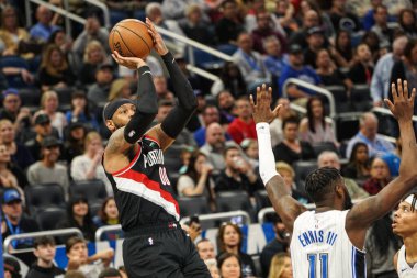 Portland Traillblazers player Carmelo Anthony #00 takes a shot during the game at the Amway Center in Orlando Florida on Monday March 2, 2020.  Photo Credit:  Marty Jean-Louis clipart