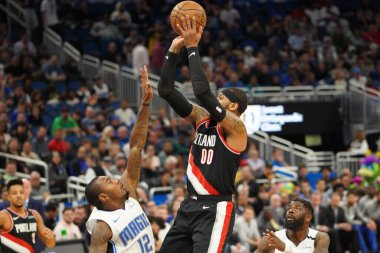 Portland Traillblazers player Carmelo Anthony #00 takes a shot during the game at the Amway Center in Orlando Florida on Monday March 2, 2020.  Photo Credit:  Marty Jean-Louis clipart