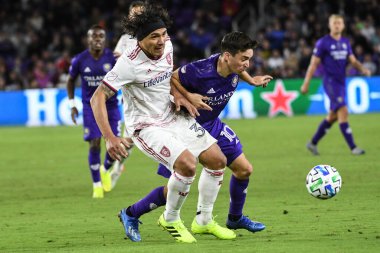 Orlando City SC oyuncusu Mauricio Pereyra # 10 ve Real Salt Lake oyuncusu Marcelo Silva # 30 numaralı maç 29 Şubat 2020 tarihinde Exploria Stadyumu 'nda oynanmıştır. Fotoğraf: Marty Jean-Louis