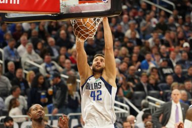 Dallas Mavericks player Maxi Kleber #42 makes a dunk  during the game at the Amway Center in Orlando Florida on Friday February 21, 2020.  Photo Credit:  Marty Jean-Louis clipart