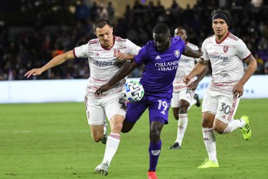 Orlando City SC oyuncusu Benji Michel # 19 ve Real Salt Lake oyuncusu Donny Toia, 29 Şubat 2020 tarihinde Exploria Stadyumu 'nda top mücadelesi verdiler. Fotoğraf: Marty Jean-Louis