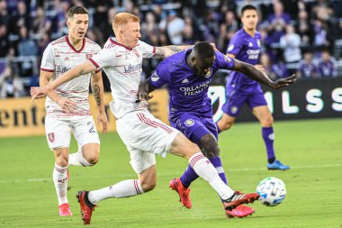 Orlando City SC oyuncusu Benji Michel # 19 ve Real Salt Lake oyuncusu Justen Glad # 15 maç Exploria Stadyumu 'nda 29 Şubat 2020' de oynanacak. Fotoğraf: Marty Jean-Louis