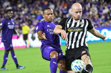 Orlando City SC ve KR Reykjavik oyuncuları 18 Şubat 2020 tarihinde oynanan Friendly Maçı 'nda Exploria Stadyumu' nda top için mücadele ederler. Fotoğraf: Marty Jean-Louis