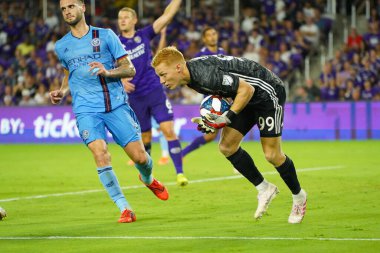 Orlando City 'nin kalecisi Adam Grinwis (99), 10 Temmuz Çarşamba günü Floria' nın Orlando kentindeki Exploria Stadyumu 'nda oynanan ABD Açık Kupasında bir golü engelledi: Marty Jean-Louis