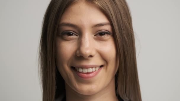 Beautiful women doctor of Caucasian appearance smiles at the camera and holds a stetoscop.Medicine. Health. Portrait — Stock Video