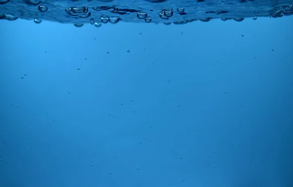 水面下の泡を背景にコピースペース — ストック写真