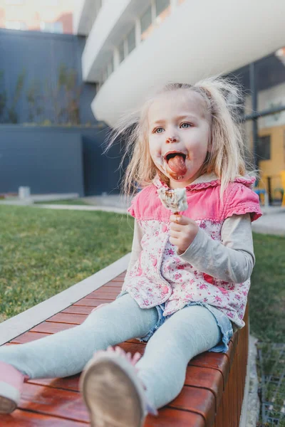 European Baby Eats Ice Cream Appetite Sticks Out Her — Stock Photo, Image