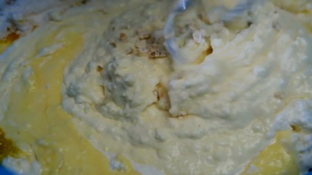 Dough beat with blender or mixer, to make pie or cookie and add oatmeal for best taste. Homemade baking. Slow motion. Close-up. — Stock Video