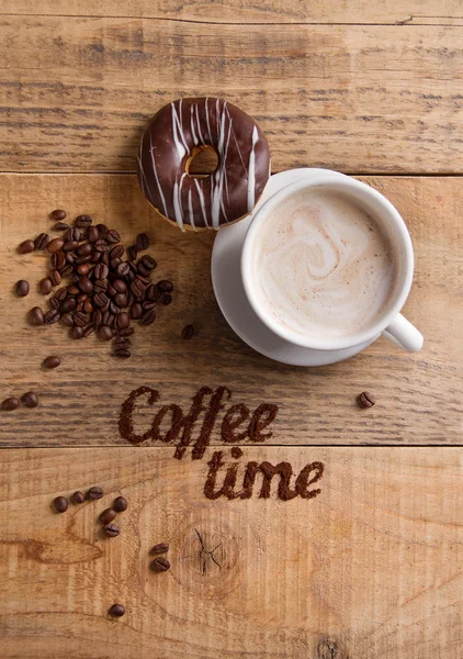 Coffee composition with cup and donut — Stock Photo, Image