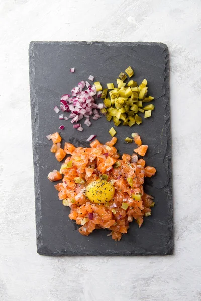 Salmon tartare with spices — Stock Photo, Image