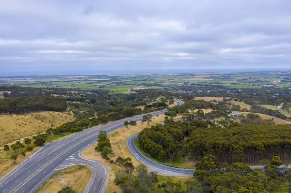 A road system running through large green farmland south of Adelaide in Australia