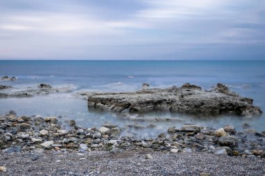 Gün batımında uzun pozlama fotoğrafçılığı.