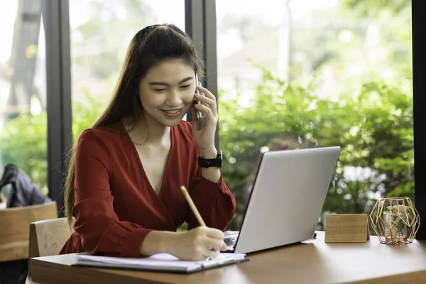 Asian Business Woman Wearing Red Dress Writing Requirement Book Talking — Stock Photo, Image