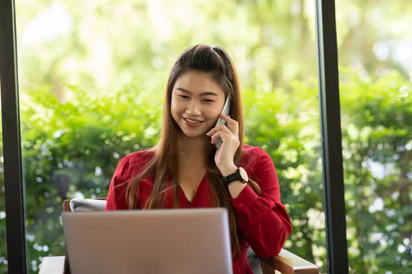 Business Asian Woman Wearing Red Dress Working Laptop Smile Talking — Stock Photo, Image