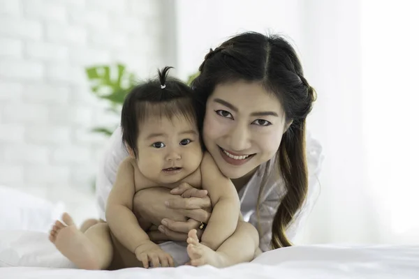 Happy Beauty Mother Hugging Cute Sweet Adorable Asian Baby Wearing — Stock Photo, Image
