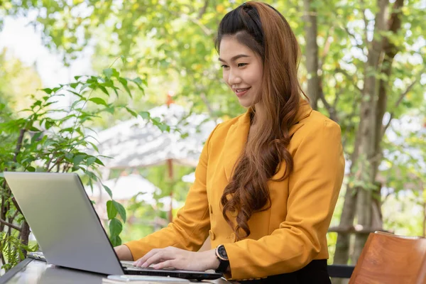 Business Asian young woman working with computer laptop and thinking to get ideas and requirement in Business startup feeling so happiness,Small Business Startup Concept