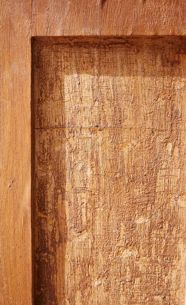Wood texture on old vintage furniture. Crack in the paint.