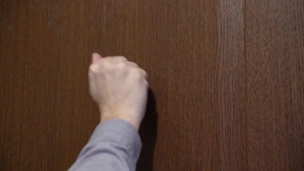 Side View Man Banging His Fist Brown Wooden Door Close — Stock Video