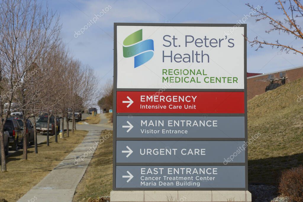 Helena, Montana / USA - March 23, 2020: St. Peter's Health Hospital sign. The health care entrance sign directing visitors and patients to the medical Emergency Room and other specific departments.