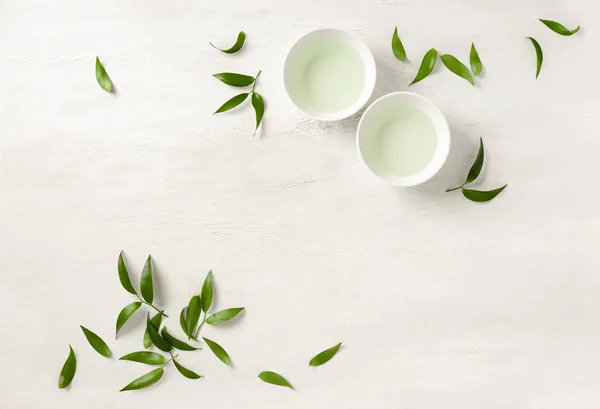 Dos tazas de té blanco, vista desde arriba fondo — Foto de Stock