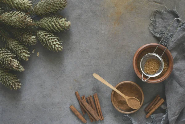 Sugar and cinnamon in ceramic bowls, Christmas baking concept — Stock Photo, Image