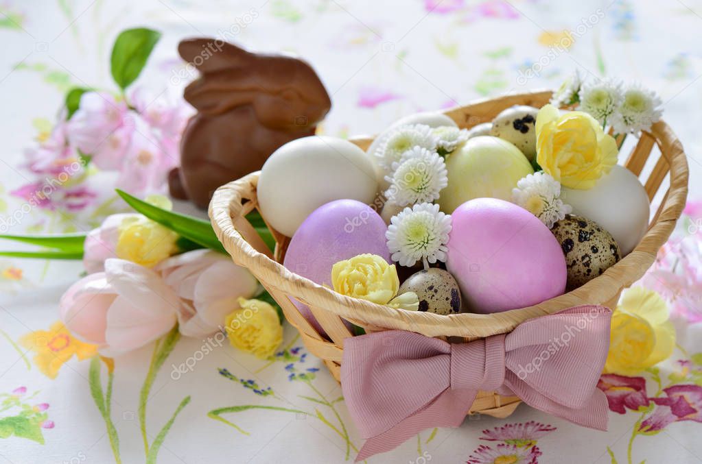 Easter basket festive arrangement on a table suface