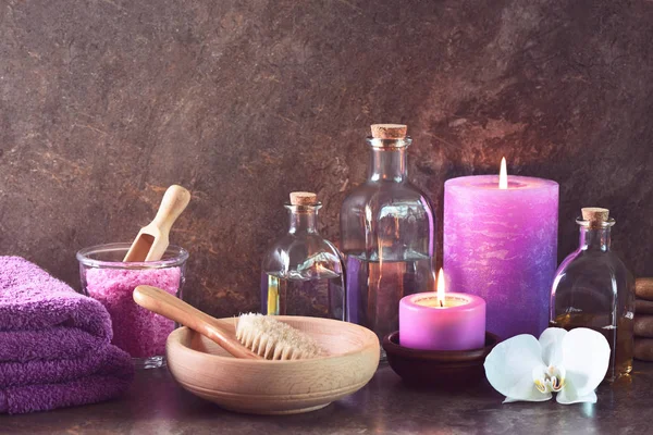 Spa natural cosmetics arrangement with aroma candles — Stock Photo, Image