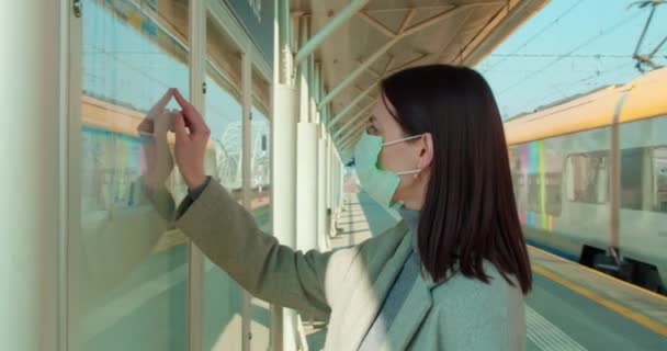 Woman Face Mask Checking Timetable Railroad Station — Stock Video