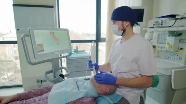 Стоматолог Сканирует Зубы Пациентов — стоковое видео