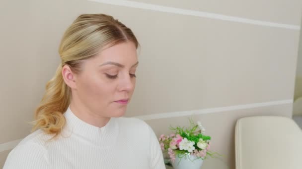 Man Checking Woman Temperature Waiting Room — Stock Video