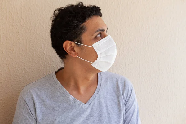 patient wearing disposable surgical mask