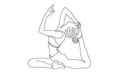 Yoga pozu veren esnek bir kadın.