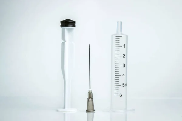 Medicine Concept Photo White Background Details Disassembled Syringe Stand Glass — Stock Photo, Image