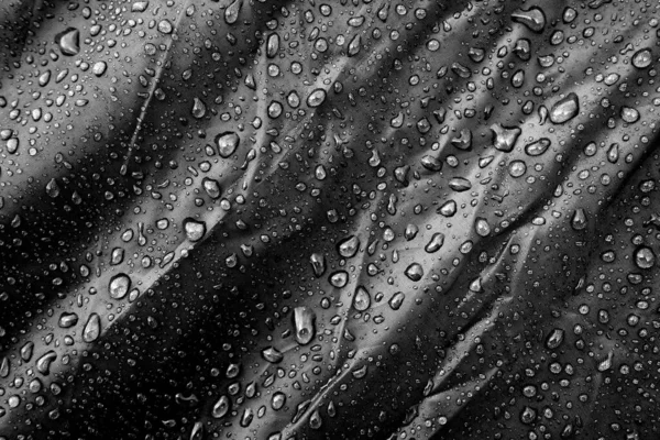 水滴在织物上 水滴在灰色的背景上 凝固汽油 水滴背景 — 图库照片