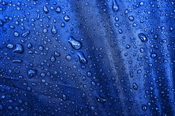Vízcseppek Anyagon Vízcsepp Kék Háttérrel Kondenzátum Vízcsepp Háttér — Stock Fotó