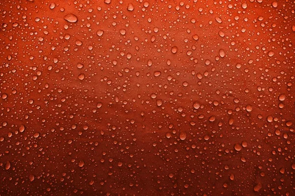 Νερό Πέφτει Στο Ύφασμα Νερό Πέφτει Κόκκινο Φόντο Συμπυκνωθείτε Νερό — Φωτογραφία Αρχείου