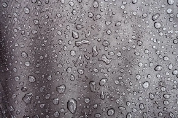 Waterproof fabric with waterdrops. Waterproof Clothing, Textile, Water.