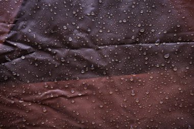Su damlalı su geçirmez kumaş. Su geçirmez Giyim, Tekstil, Su. 