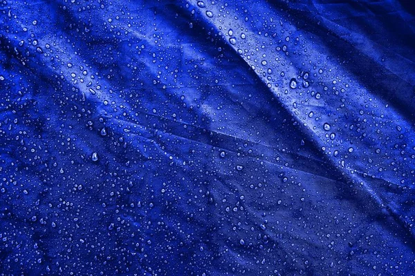 Water drops on the fabric. Water drops on the background. Condensate. Water drops background.