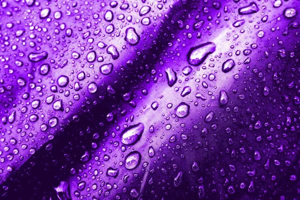 Water drops on the fabric. Water drops on the background. Condensate. Water drops background.