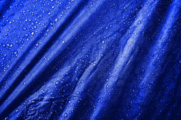 Water drops on the fabric. Water drops on the background. Condensate. Water drops background.