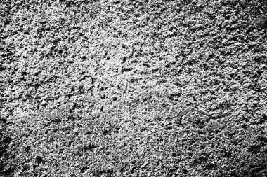 Arkaplan olarak kullanılmak üzere küçük taşlarla sıvanmış duvarın görüntüsü.