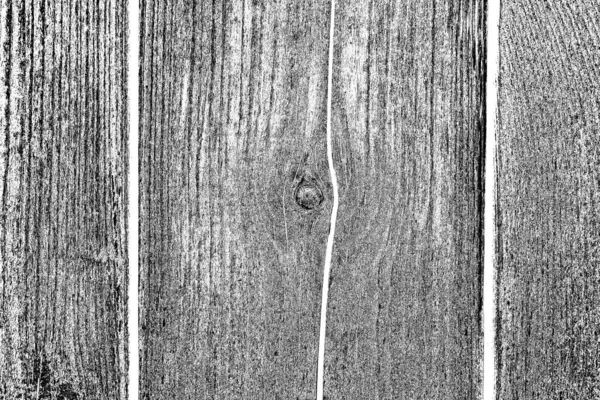 Old plank wooden wall background. The texture of old wood. Weathered piece of wood.