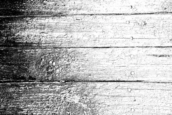 Old plank wooden wall background. The texture of old wood. Weathered piece of wood.