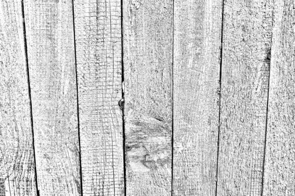 Old plank wooden wall background. The texture of old wood. Weathered piece of wood.