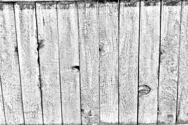 Old plank wooden wall background. The texture of old wood. Weathered piece of wood.